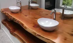 Wooden countertop in the bathroom photo design