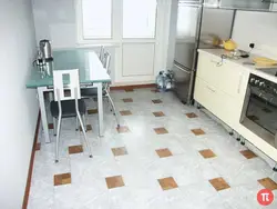 Linoleum on the wall in the kitchen photo