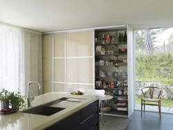 Full-wall kitchen cabinet photo