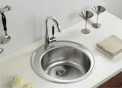 Kitchen sinks are round and no photo