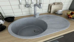 Kitchen sinks are round and no photo