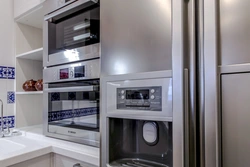 Photo of refrigerator and oven in the kitchen