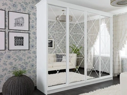 White Wardrobe With Mirror In The Bedroom Photo