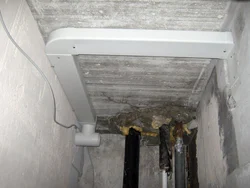 One hood per toilet and bathroom photo