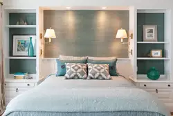 Built-in shelves in the wall in the bedroom photo