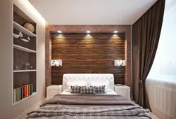 Built-in shelves in the wall in the bedroom photo