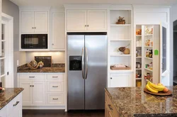 Photo of a refrigerator in the kitchen in one line