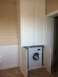 Washing machine case in the bathroom photo