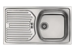 Overhead kitchen sinks made of stainless steel photo
