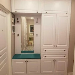 Built-in wardrobes with mezzanines in the hallway photo