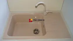 Kitchen faucet made of artificial stone photo