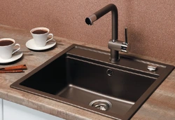 Kitchen faucet made of artificial stone photo