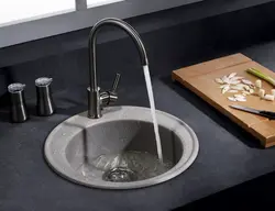 Kitchen faucet made of artificial stone photo