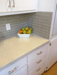 Apron and countertop in the kitchen tiles photo