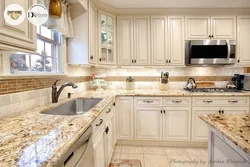 Apron and countertop in the kitchen tiles photo