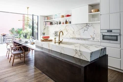 Apron and countertop in the kitchen tiles photo