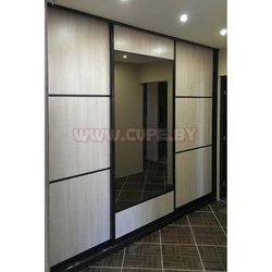 Photo of a wardrobe in the hallway 3 doors