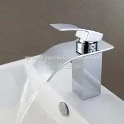 White bathroom sink faucet photo