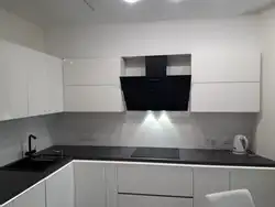 If the kitchen is glossy and the apron is matte photo