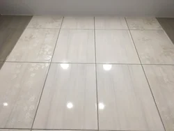 Dark or light bathroom floor photo