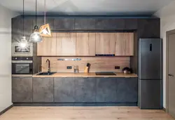 Loft üslubunda tutacaqları olmayan bir mətbəxin fotoşəkili