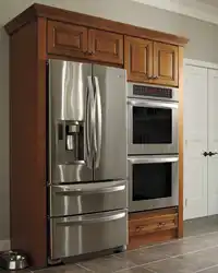 Kitchens with pencil case and built-in refrigerator photo