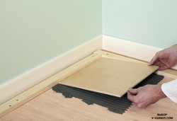 Tiles On Wooden Floor In Bathroom Photo