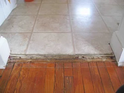 Tiles On Wooden Floor In Bathroom Photo