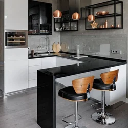 Kitchen with bar counter and TV photo