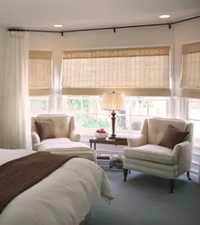 Tulle with roller blinds in the living room photo