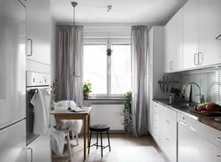 Window in the kitchen in Scandinavian style photo