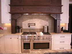 Photo of a kitchen with hob and hood
