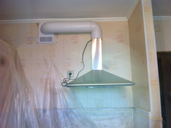 Photo of a gas pipe and hood in the kitchen