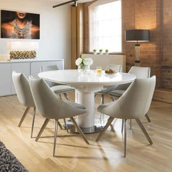 Chairs in the living room photo with a round table