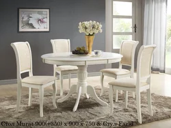 Chairs in the living room photo with a round table