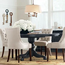 Chairs in the living room photo with a round table