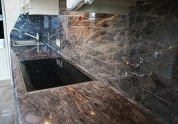 Kitchen countertops photo with black tiles