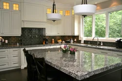 Kitchen countertops photo with black tiles