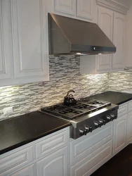 Kitchen countertops photo with black tiles