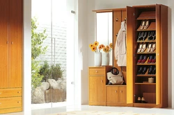 Corner wardrobe and shoe rack in the hallway photo