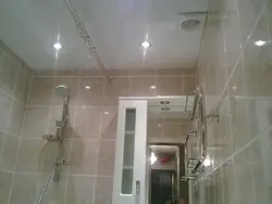 Ceiling in a small bath and toilet photo