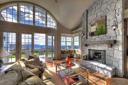Living Room With Fireplace And Panoramic Windows Photo