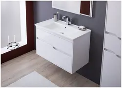 White Cabinets With Sink In The Bathroom Photo