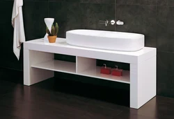 White cabinets with sink in the bathroom photo