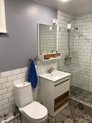 Photo of bathtub and toilet in brick houses