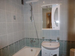 Photo of bathtub and toilet in brick houses