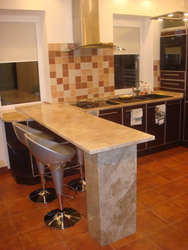 Photo of kitchen bar counters made of marble