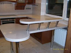 Photo of kitchen bar counters made of marble