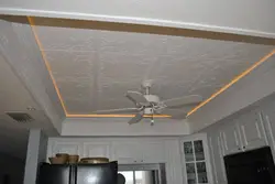 Ceiling tiles on the walls in the kitchen photo