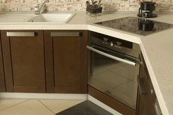 Photo of an oven built into a corner kitchen